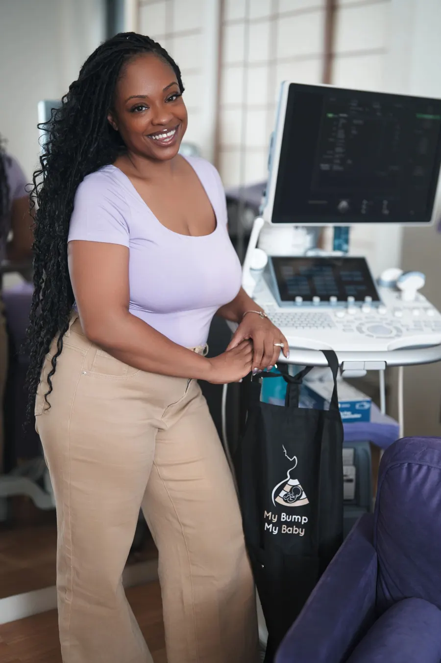 Charlotte Williams, registered midwife and founder of My Bump My Baby, standing in the scan studio